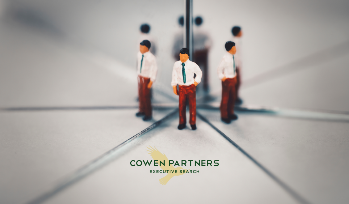 Business man reflected by mirrors